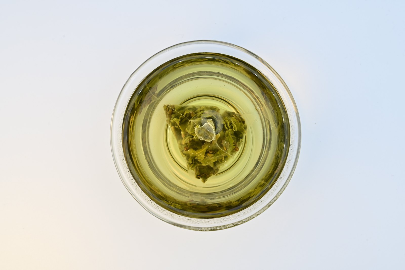 Shan Lin Xi High Mountain Oolong brewing in the cup